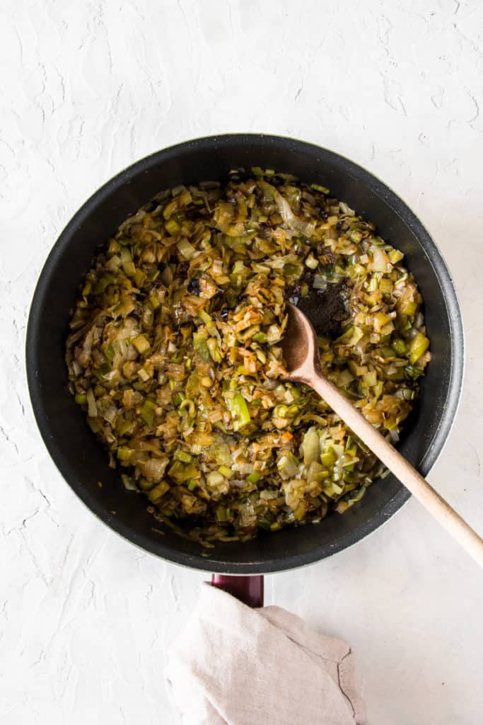 Caramelized leek and onion in a pan for a leek frittata