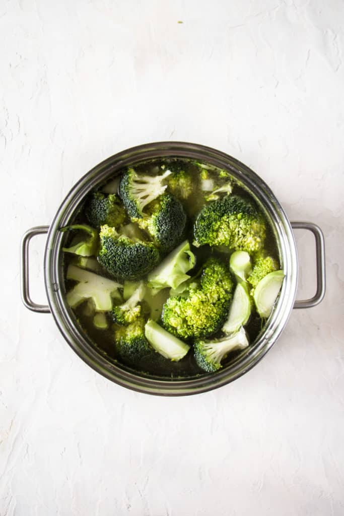 Ingredients for a vegan brocoli soup in a pot