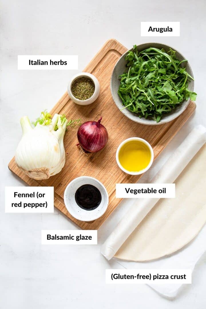 Ingredients for a fennel cheeseless pizza with descriptive labels.