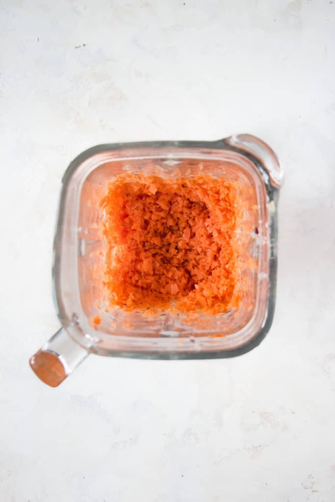 Chopped carrots in a high-speed blender.