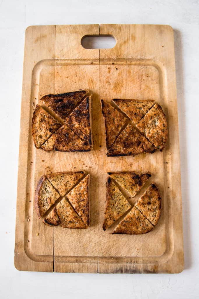 Garlic bread on a cutting board