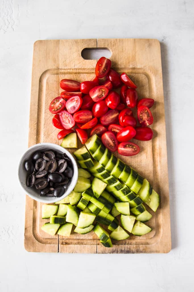 Ingredients for mediterranean tomato cumber salad