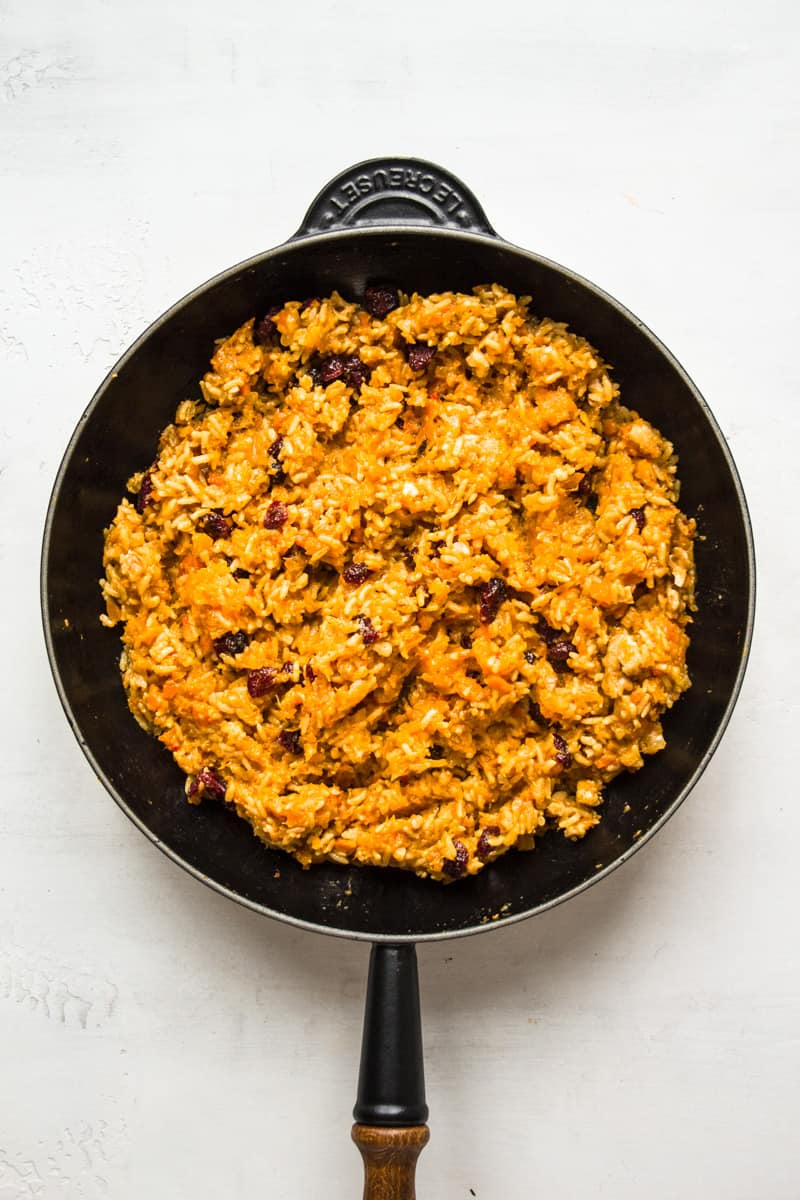 Vegan rice stuffing in a black pan.