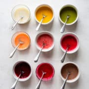 9 icing of different colors made with real foods.