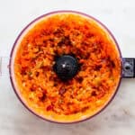Finely chopped carrots, celery, and onion in a food processor.