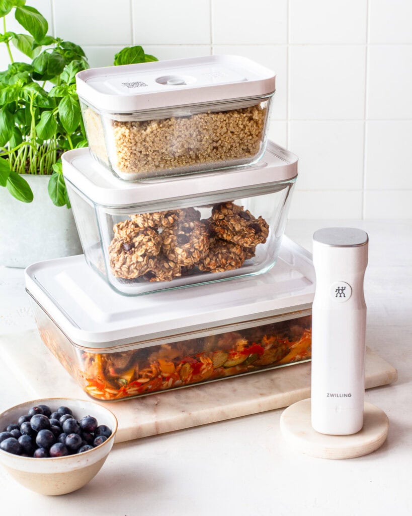 Three vacuum-seal glass containers stacked on top of each other.